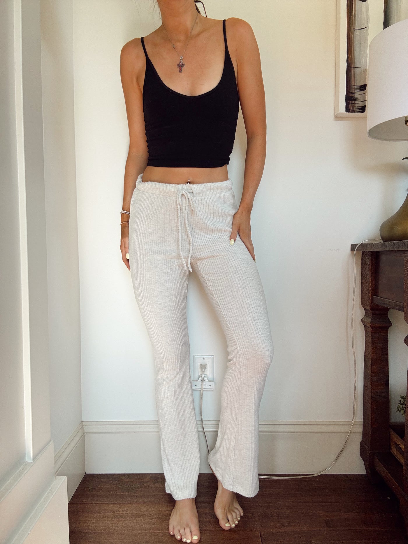 The group Babaton Aritzia oatmeal pants