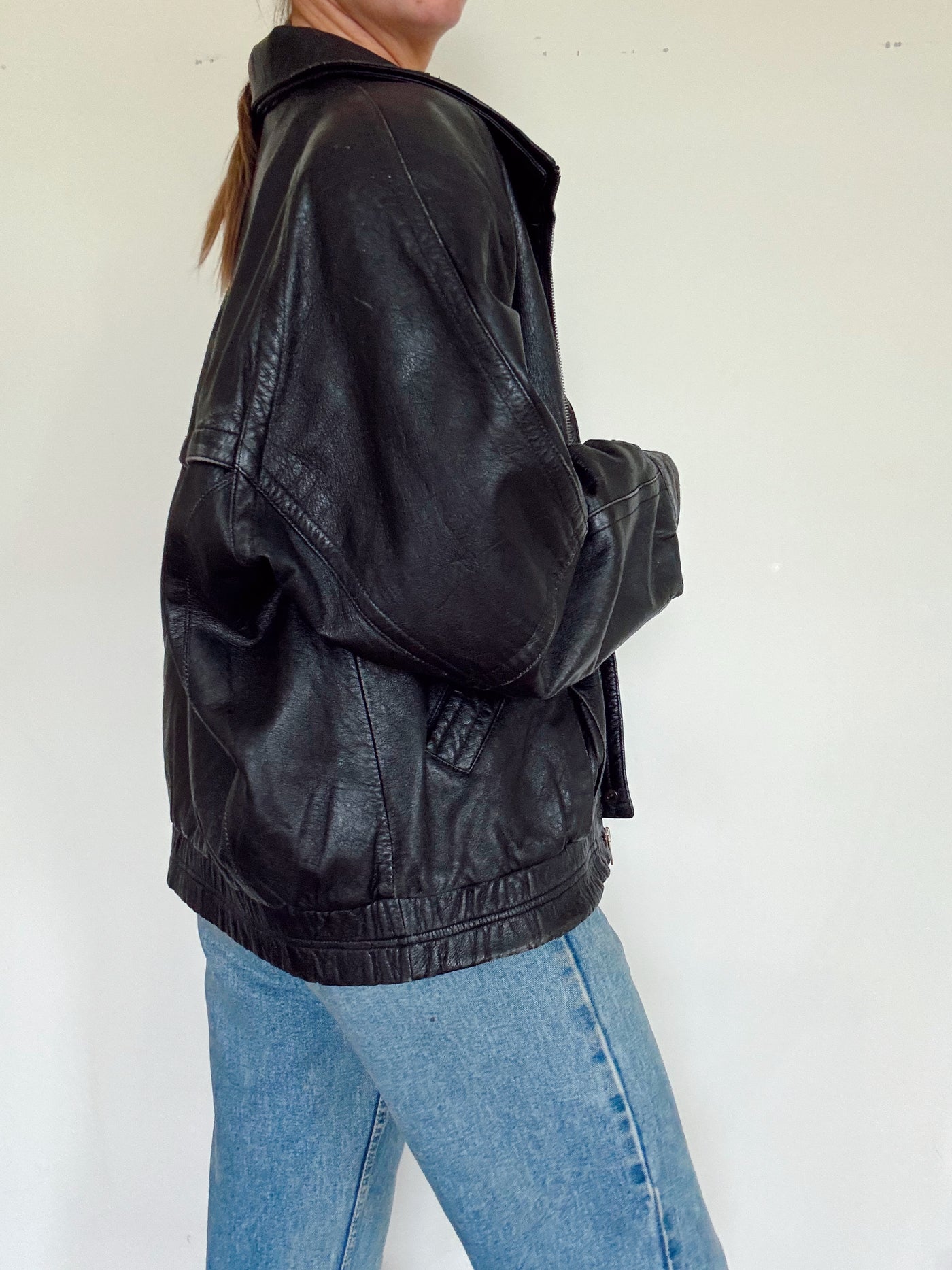 Vintage black leather bomber jacket