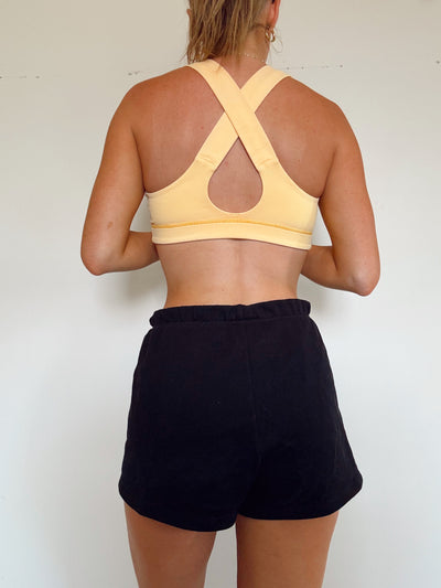 Butter yellow Lululemon sports bra