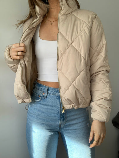 Neutral fuzzy lined pleated jacket