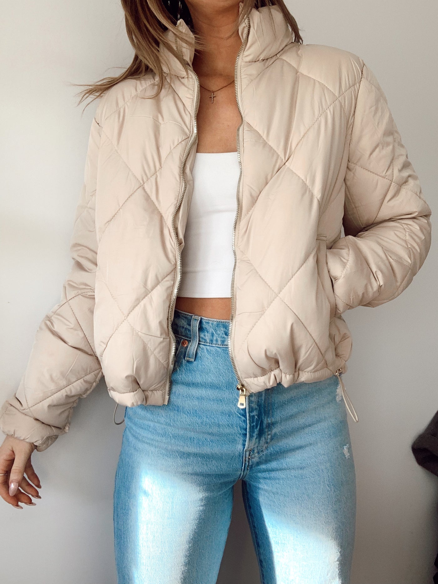 Neutral fuzzy lined pleated jacket