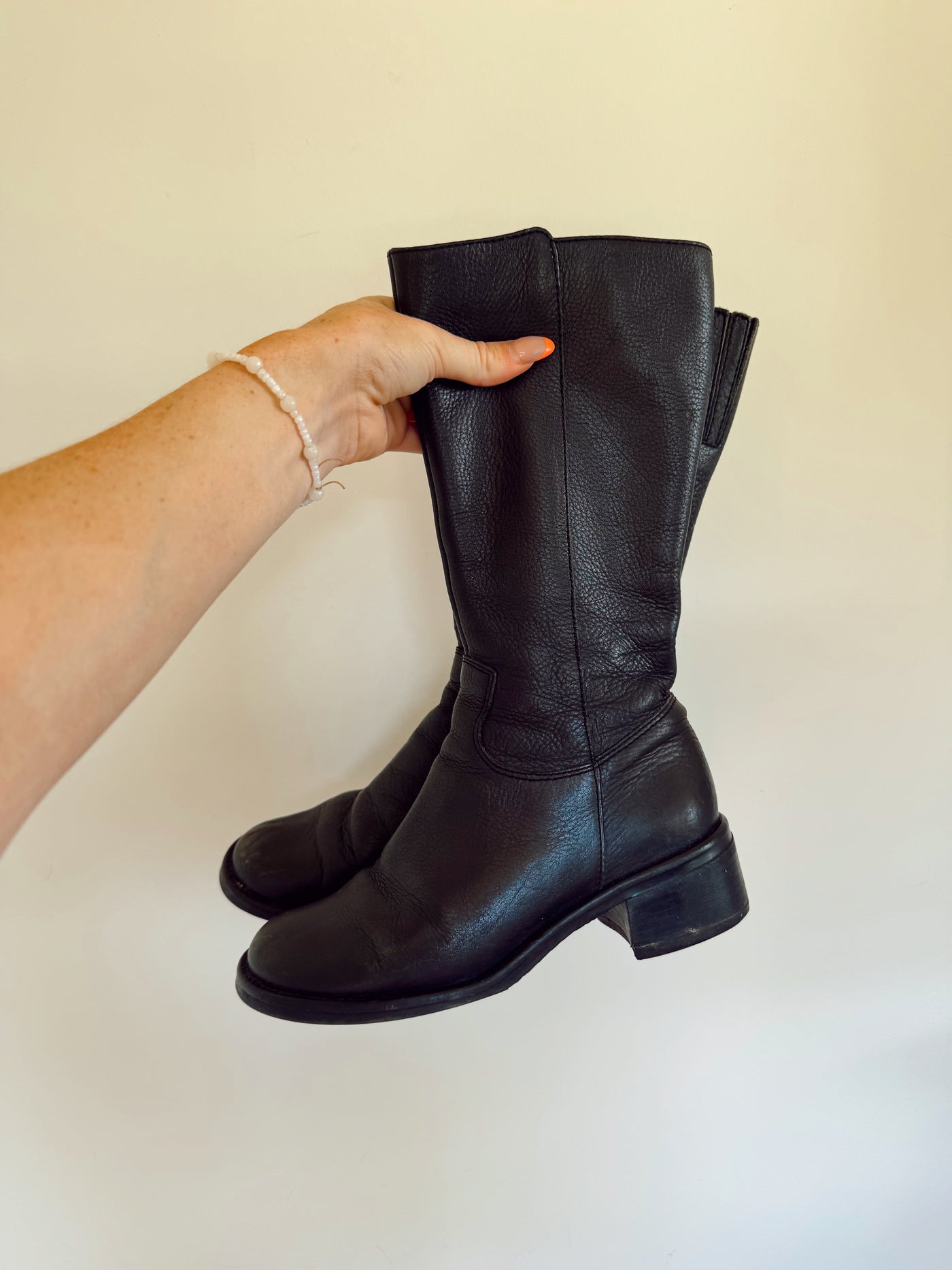 Black leather staple fall boots